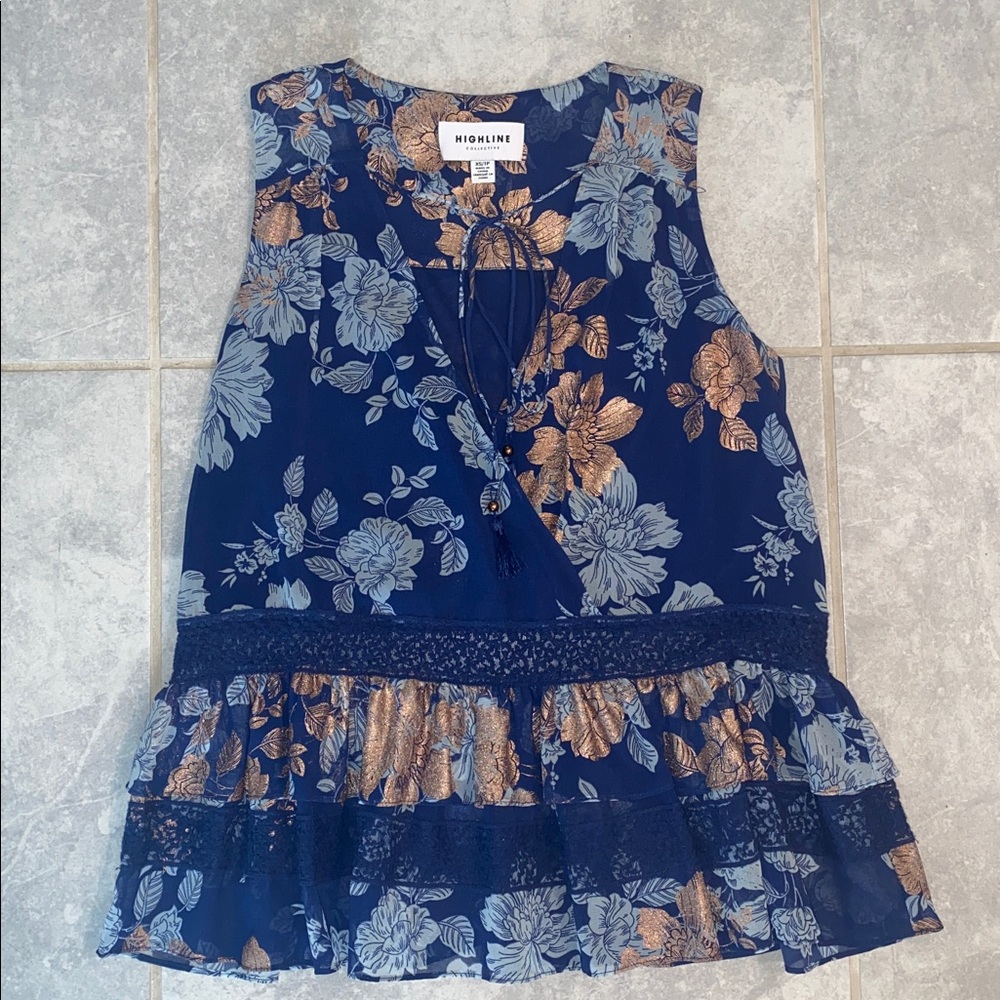 Floral Sleeveless Top with Ruffle Hem